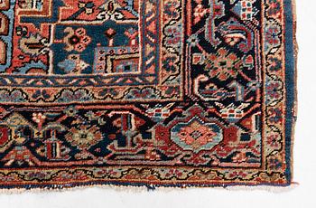 A semi-antique Heris carpet, c. 364 x 299 cm.