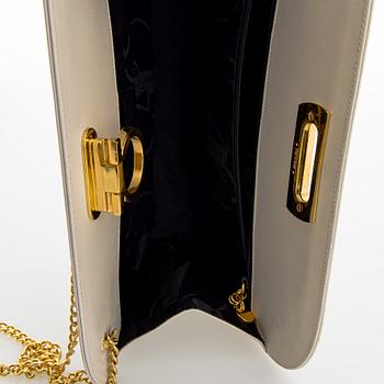 Salvatore Ferragamo, a leather “Gancini”bag.