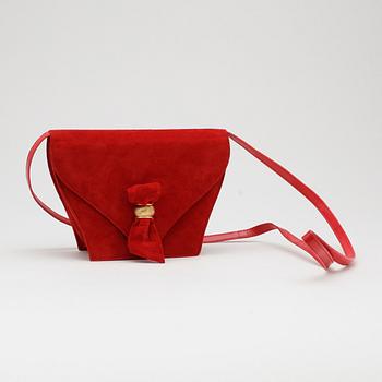 CHARLES JOURDAN, a pair of red suede pumps with matching shoulder bag.
