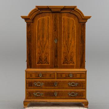 A CUPBOARD, late baroque-style, 20th century.