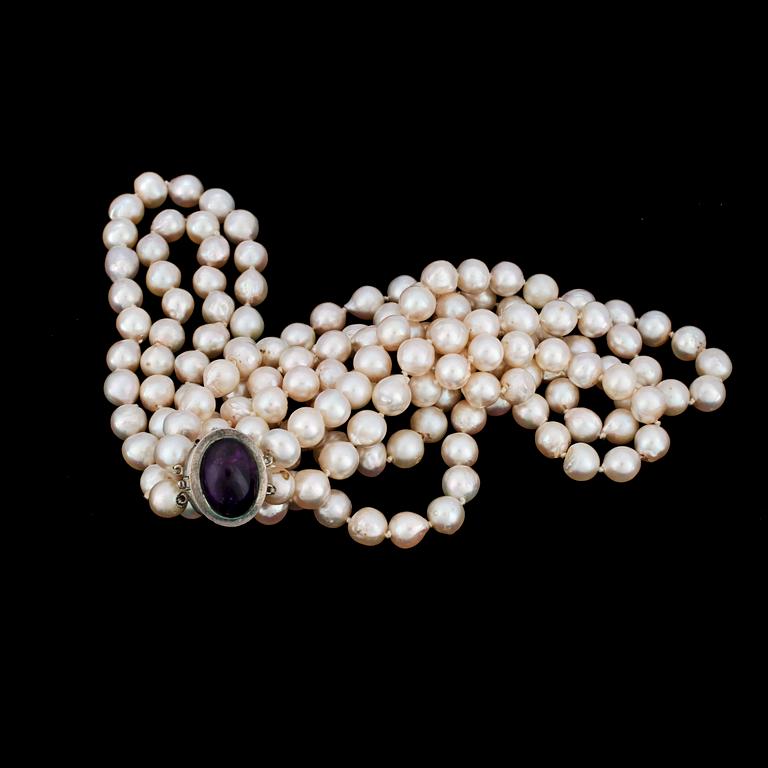 a two strand cultured pearl necklace, 7, 9 mm, amethyst  clasp.