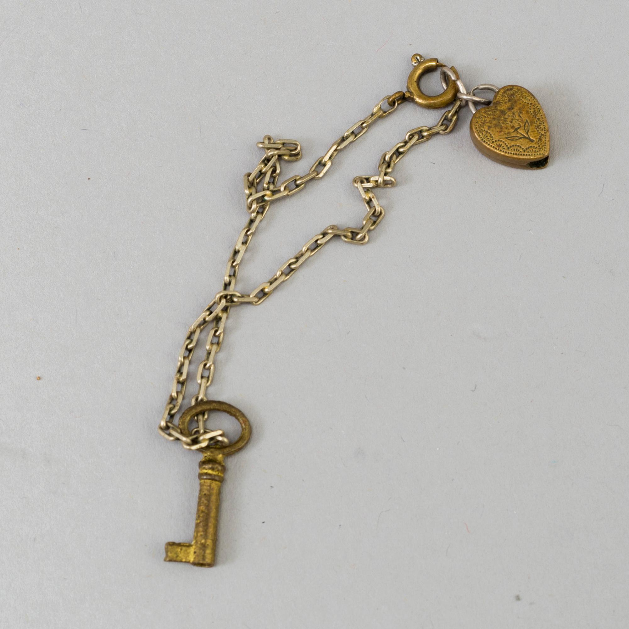 SKRIN med LOCK, glas och förgylld mässing, 1800-talets slut.