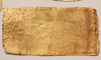 A set of nine presumably modern Egyptian-style gold foil sheets with figures and hieroglyphs.