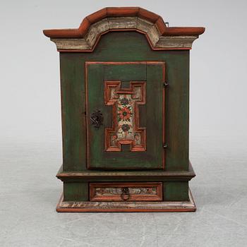 A 18/19th Century painted wall cabinet.