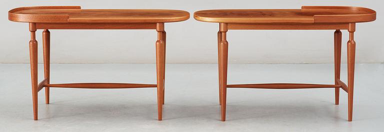 A pair of Josef Frank mahogany tables by Svenskt Tenn.