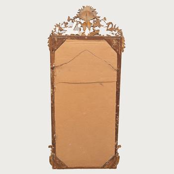 A Neo Rococo bronzed mirror around 1900.