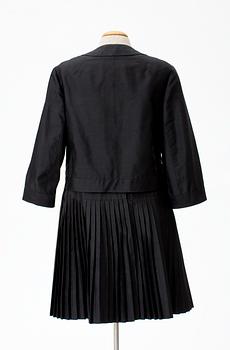 A 1960's Modèle André Originale two piece suit.