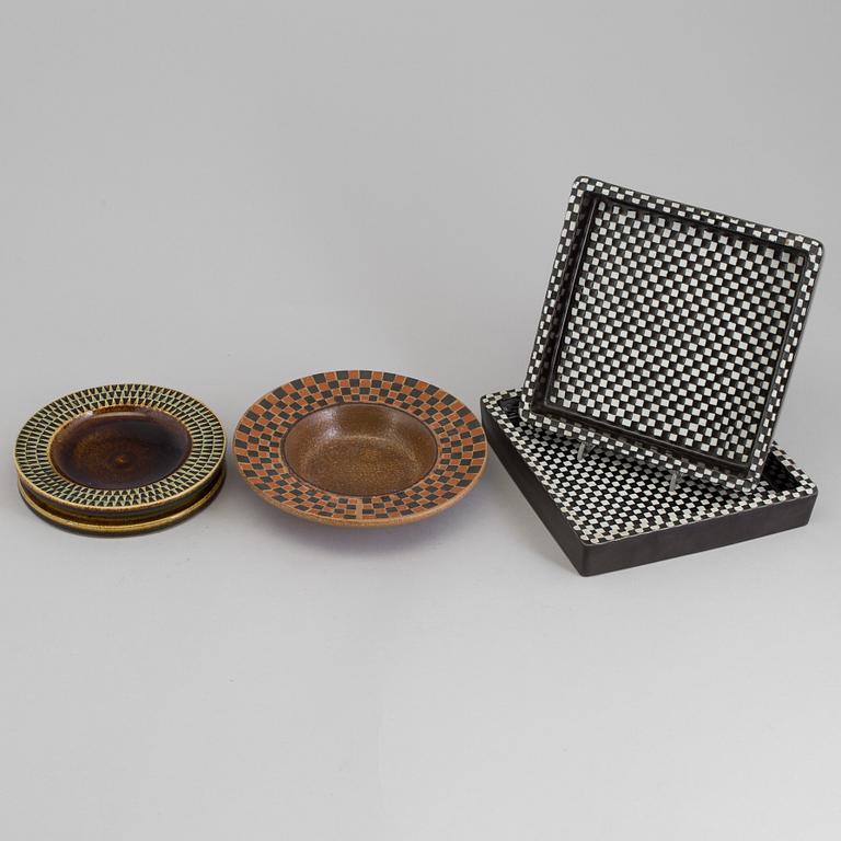 Four mid 20th century dishes by Stig Lindberg for Gustavsberg, two 'Domino', one 'Silur' and one signed.