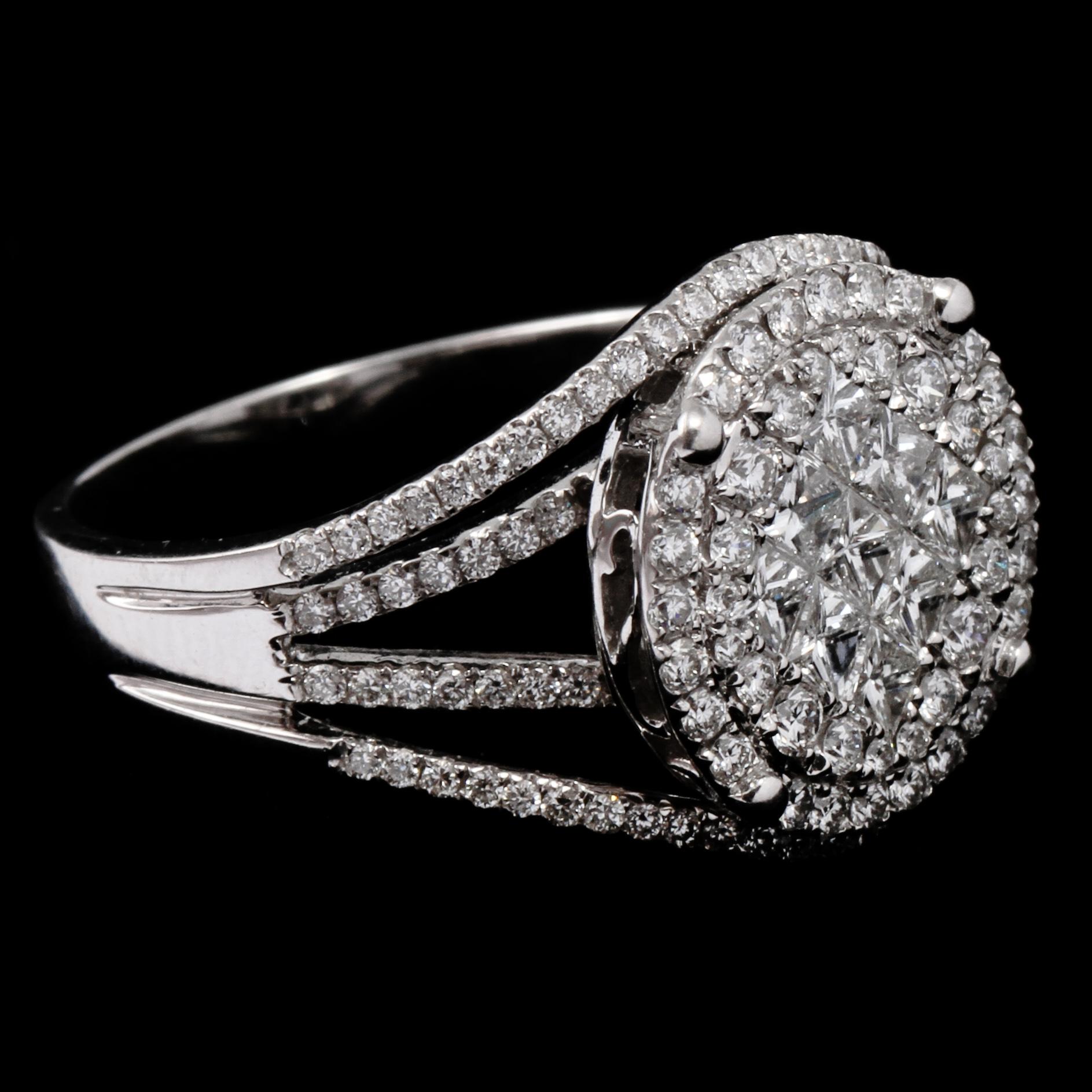 RING, 18k vitguld, med 128 briljantslipade och 9 prinsesslipade diamanter, tot ca 1.31 ct, 2000-tal. Vikt 6 g.