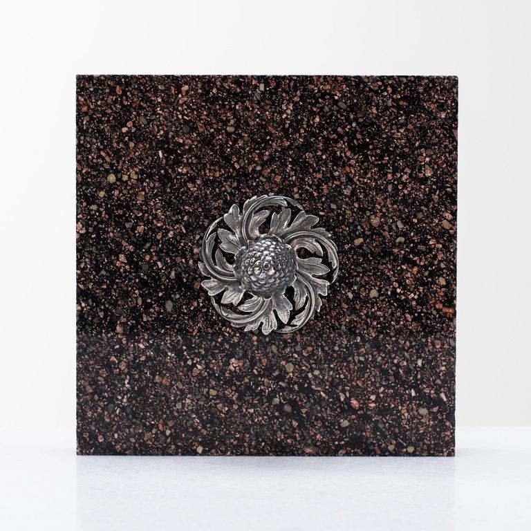 A Swedish 19th century porphyry paperweight.