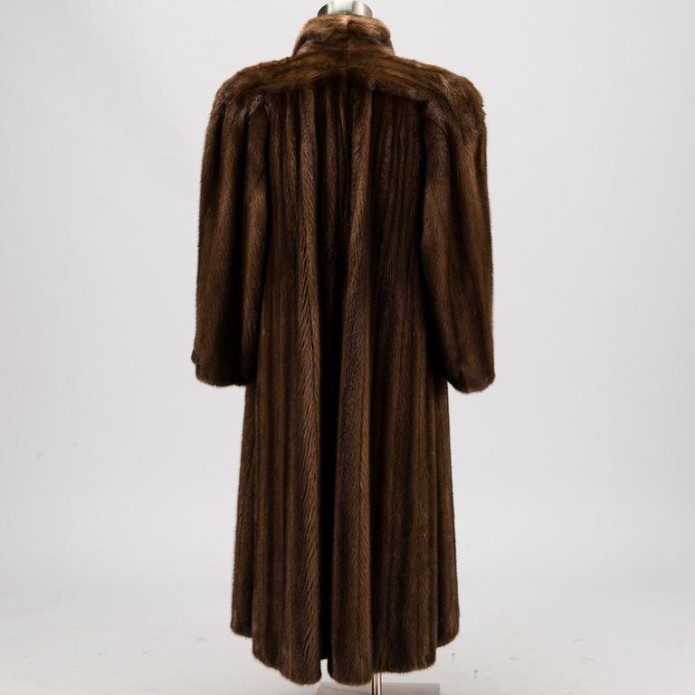 A Long Brown Mink Coat by Grosvenor to Harrods.