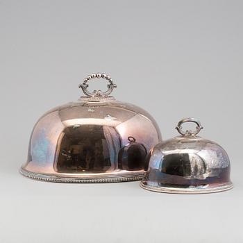 Two silver plated food covers, one by Thomas, New Bond Street, London, England, about 1900.