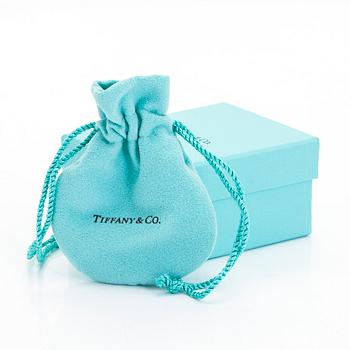 Tiffany & Co, an 18K gold 'Atlas Key' pendant with chain.