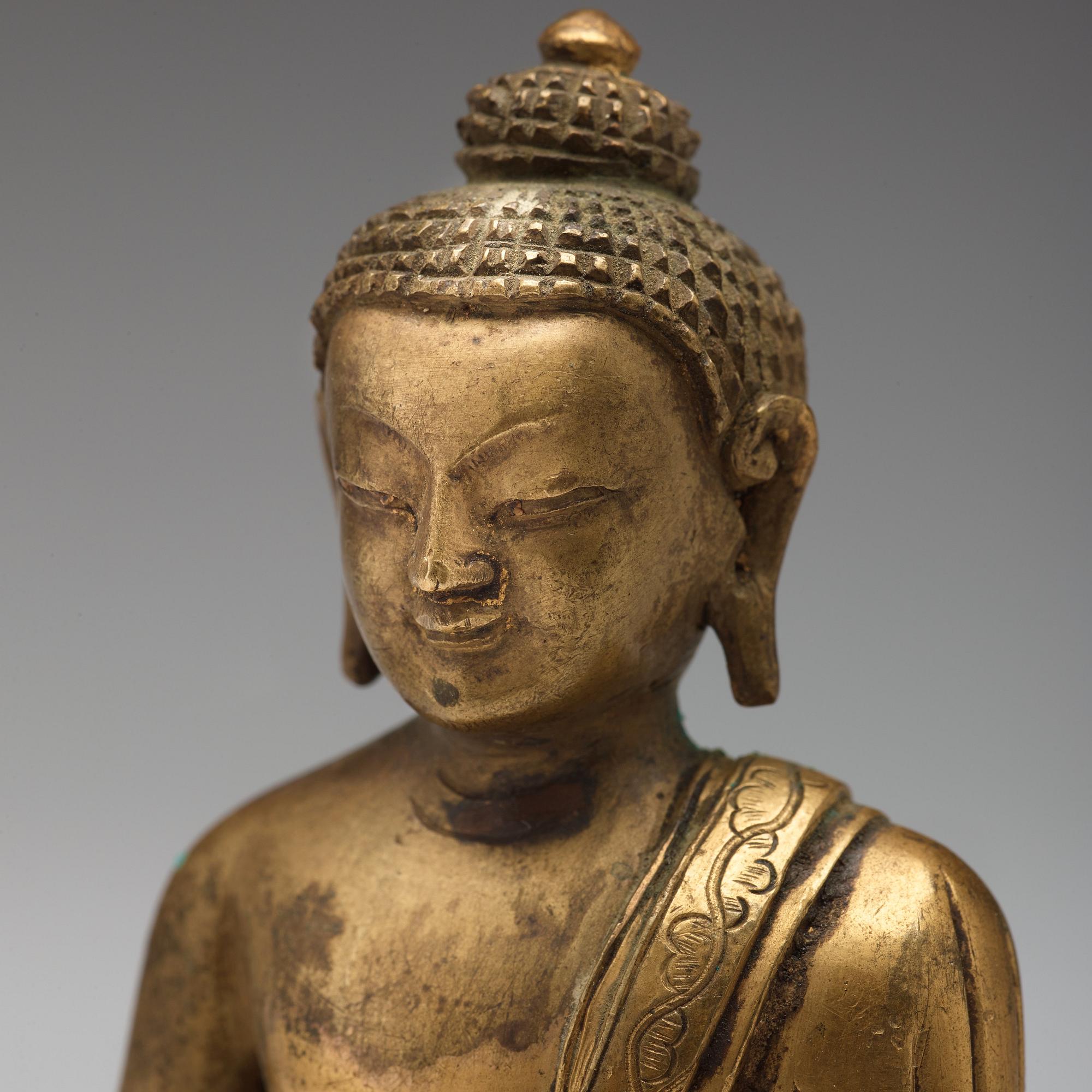 Two copper alloy figures of buddha, Sino-Tibetan, circa 1900.