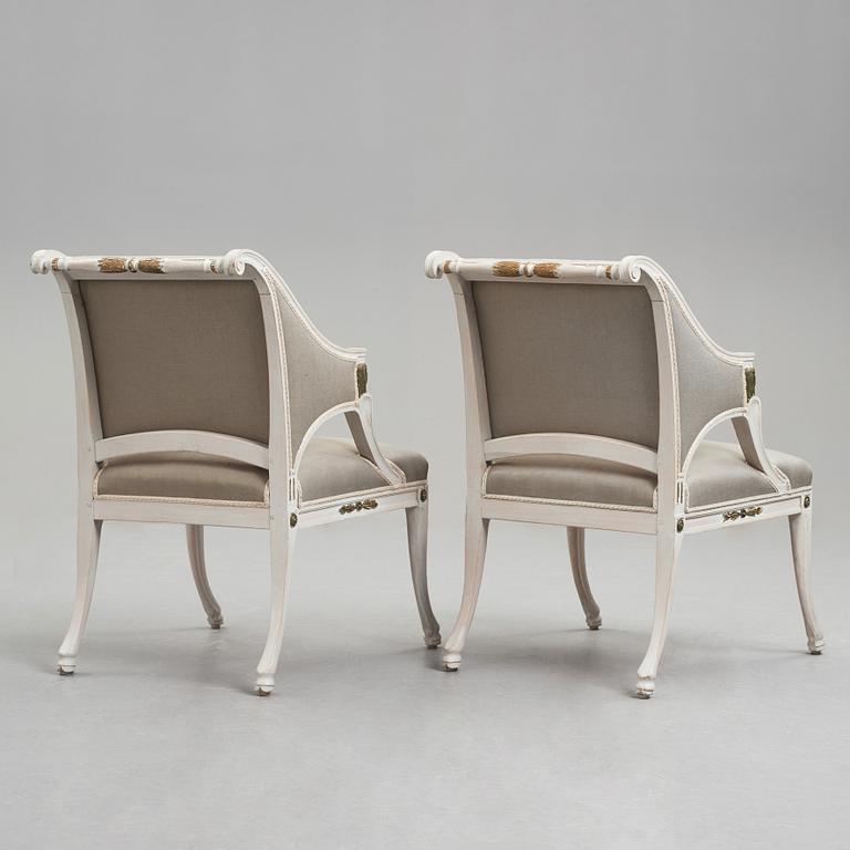 A pair of late Gustavian early 19th century armchairs.