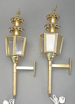 VAGNSLYKTOR/VÄGGLAMPOR, 2 st, mässing, empirstil, 1900-talets första hälft.