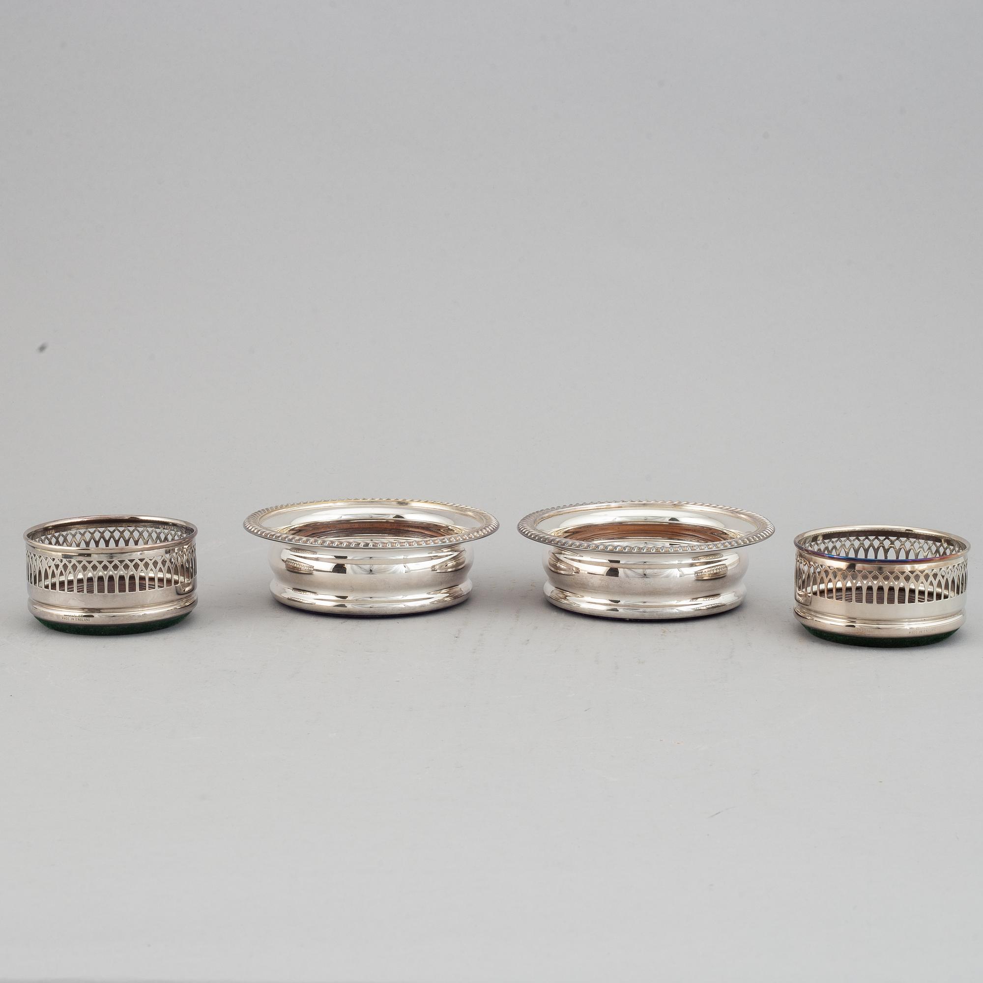Coasters, two pairs, silver plate, England.