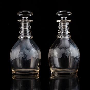 A pair of mid 19th century glass decanters and stoppers.