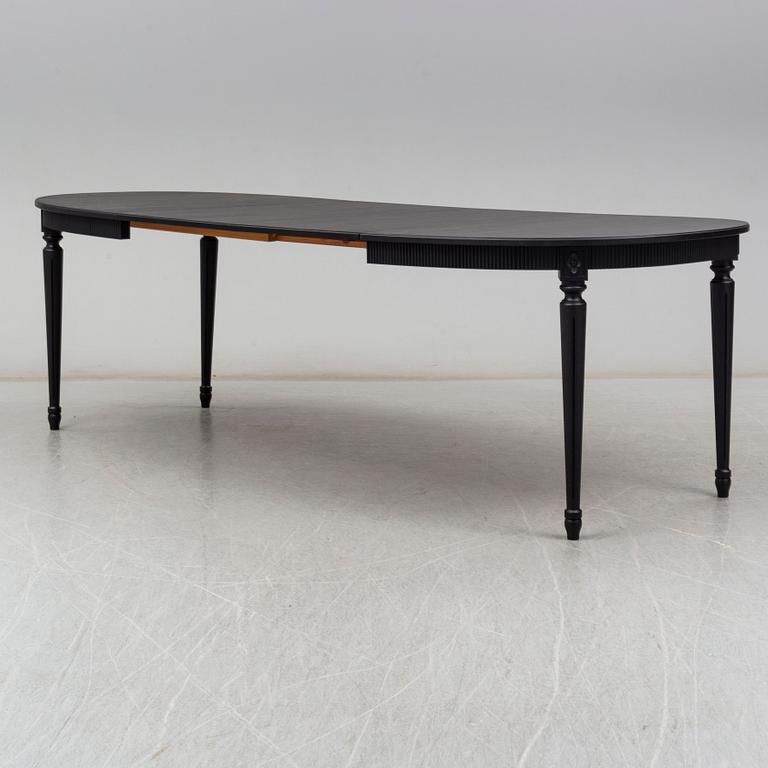 A second half of the 20th century Gustavian style dining table.