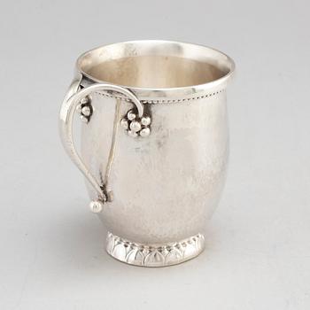 GEORG JENSEN,  a 830/1000 silver mug and  a bowl (a christening set), Copenhagen ca 1918-1927, design nr 127, 158.