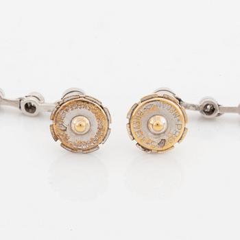 A pair of platinum and pearl earrings set with round brilliant- and eight-cut diamonds.