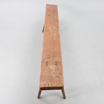 A folk art bench, 19th century.