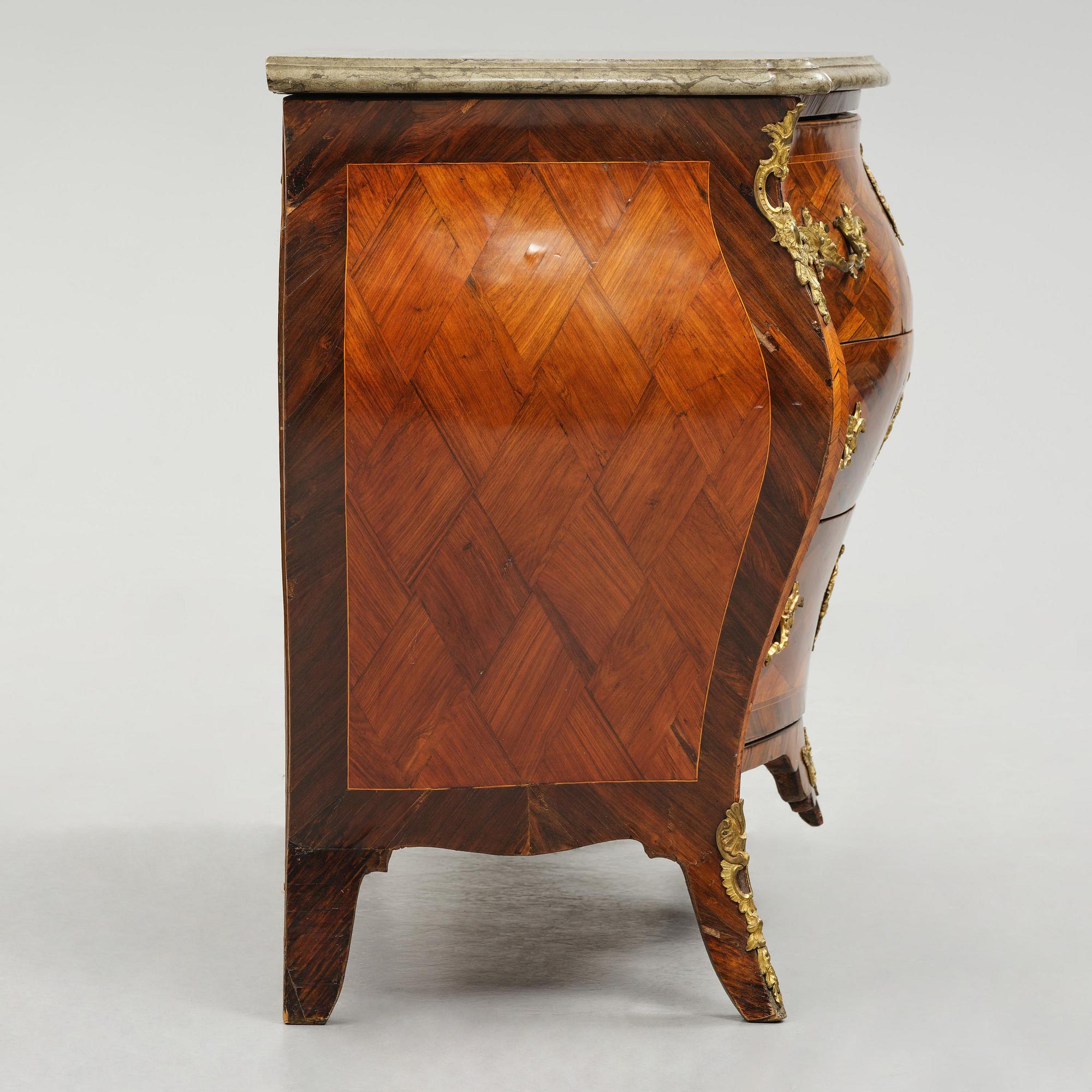 A Swedish rococo parquetry commode attributed to J. Noraeus (master in Stockholm 1769-81).