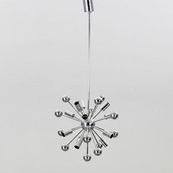 A Paul de Haan Sputnik pendant.