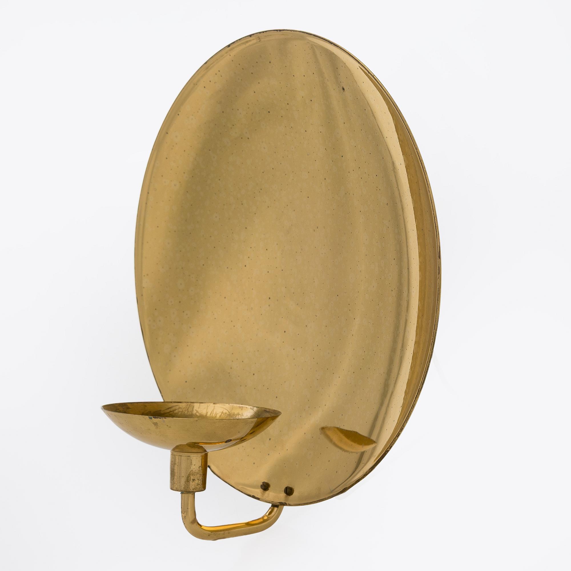 Kaija Aarikka, a late 20th century wall sconce for Aarikka Finland.