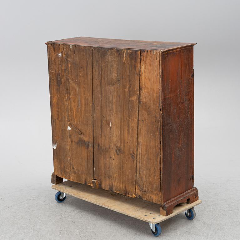 A 19th century cabinet.
