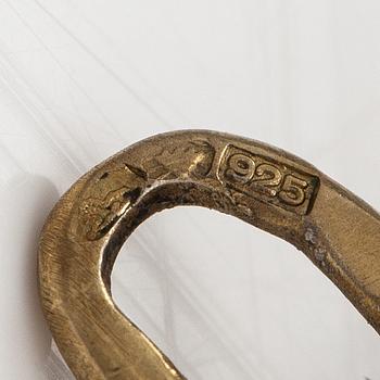 An egg pendant made of sterling silver and enamel. Import marked Kultakeskus, Helsinki.