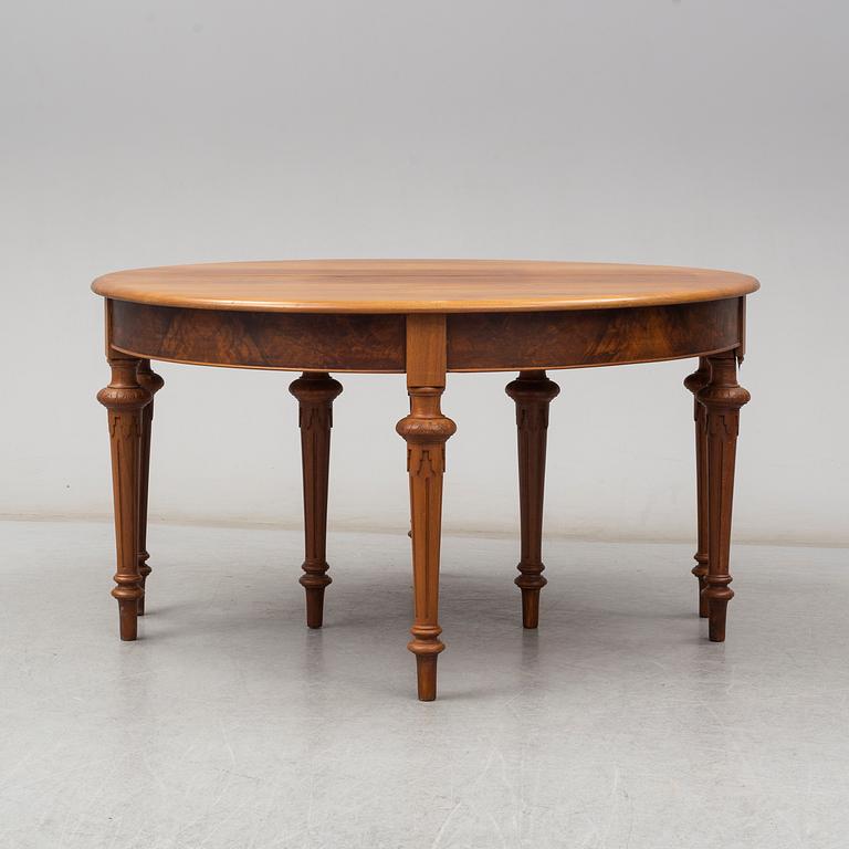 A DINING TABLE, second half of the 19th century. 5 painted leaves included.