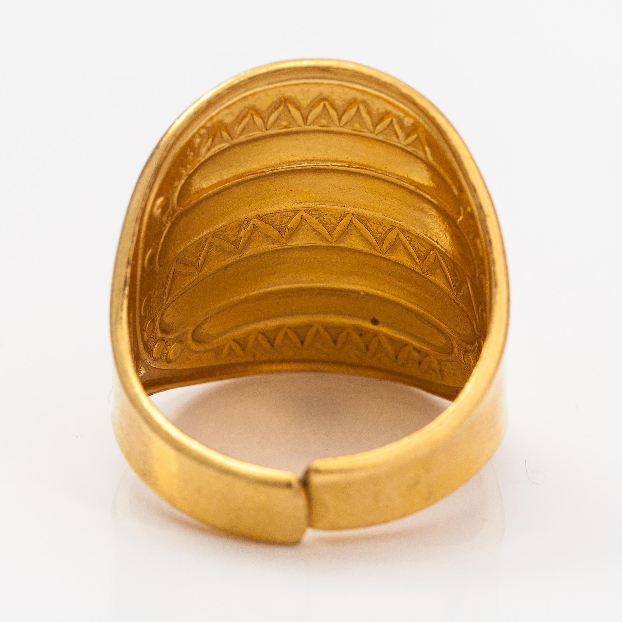 A gold plated bronze ring "Perniö-ring", model 111. Kalevala Koru, Helsinki.