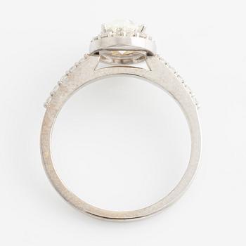 Ring with oval diamond, accompanied by GIA report.