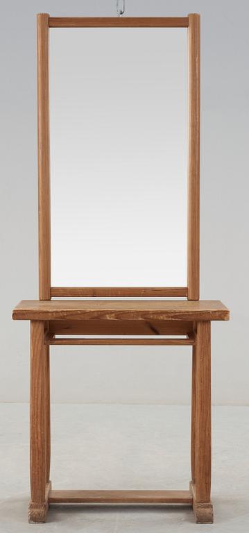 An Axel Einar Hjorth stained pine console table and mirror probably 'Sandhamn', Nordiska Kompaniet.