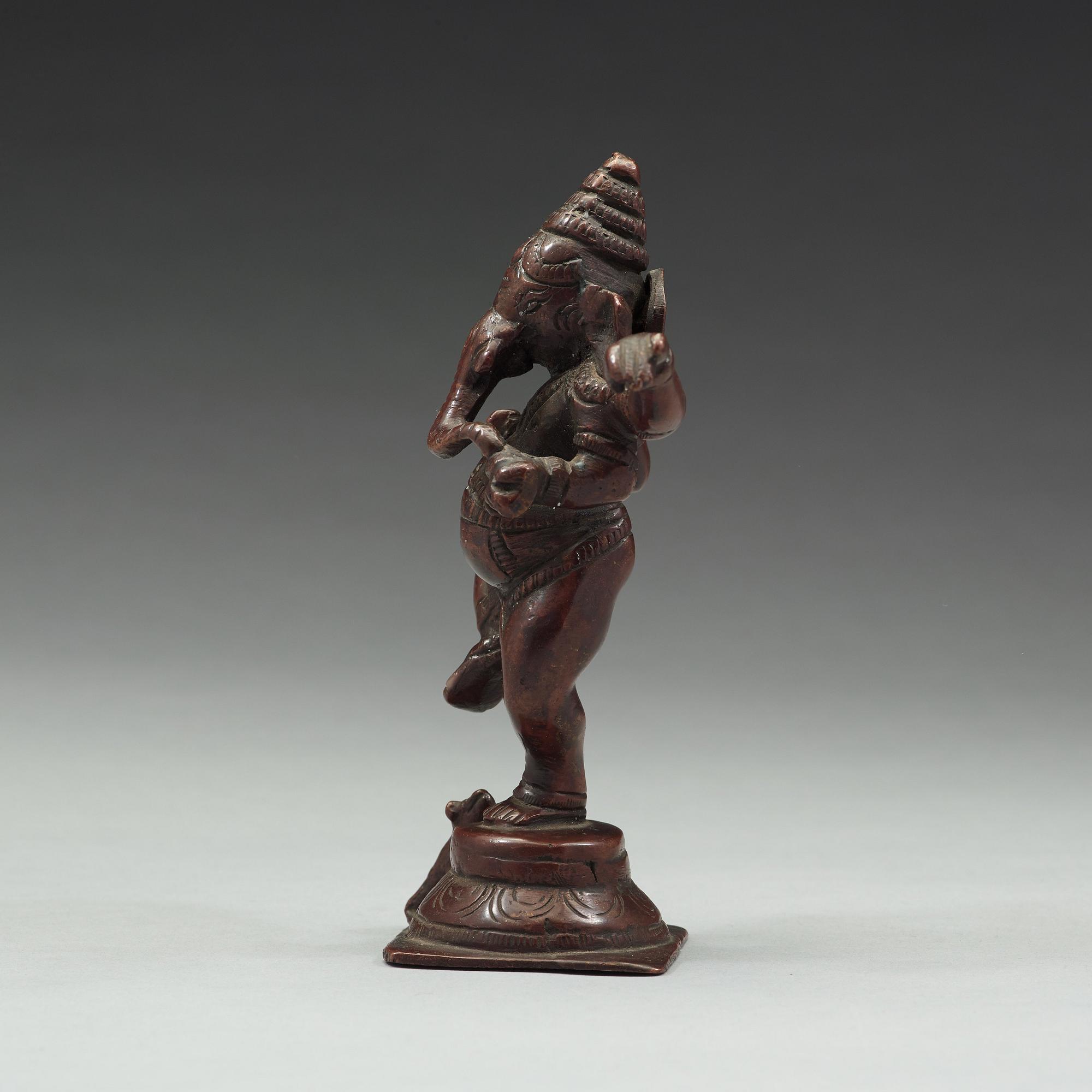 A bronze figure of Ganesha, India, 20th Century.