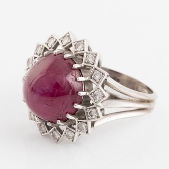 Ring, Strömdahls, with a cabochon-cut ruby and brilliant cut diamonds.