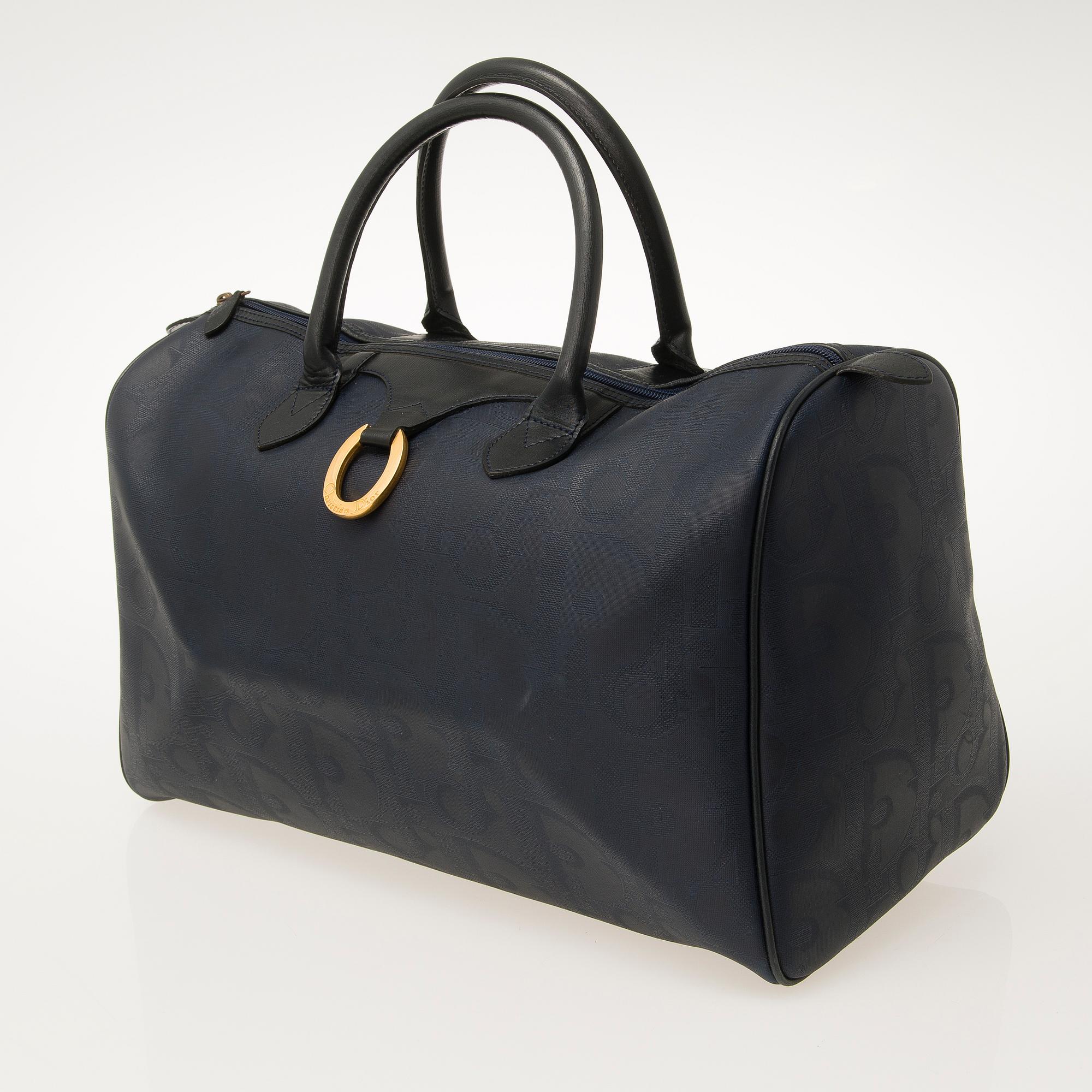 CHRISTIAN DIOR, Blue Monogram Coated Canvas Duffel Bag.
