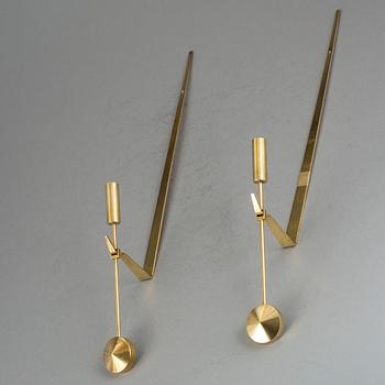 VÄGGLAMPETTER, ett par, mässing, "Pendeln", Pierre Forsell, Skultuna, 1900-talets fjärde kvartal.