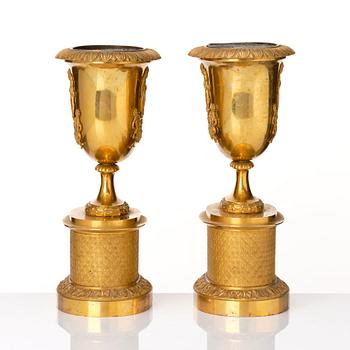 A set of three French Empire early 19th century gilt bronze centre pieces.