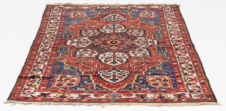 An Oriental carpet, circa 207 x 133 cm.