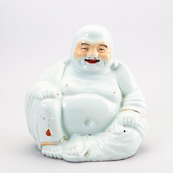 A Chinese 20th century porcelain figurine.