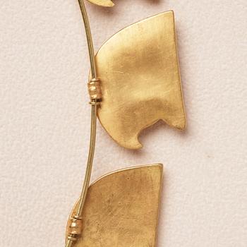 A modern Egyptian-style gold necklace.