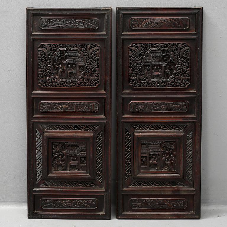 Two Chinese wooden carved panels, 20th century.