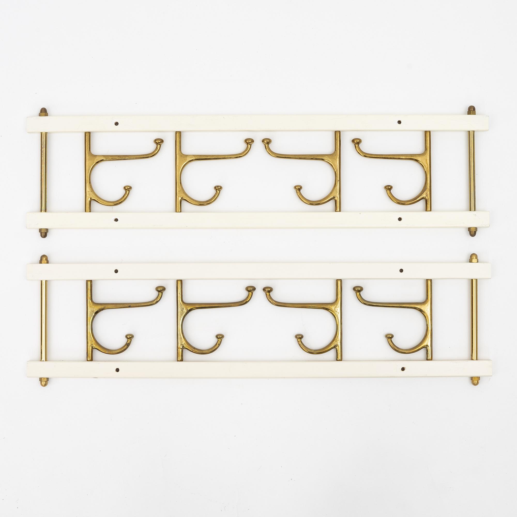 Klädhängare, ett par, "Dekorativ", Skoglunds metallgjuteri, Anderstorp, 1950-/60-tal.