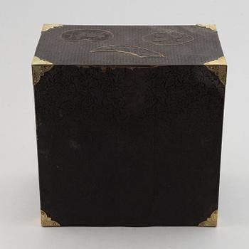 A Japanese lacquered cabinet, Meiji, circa 1900.