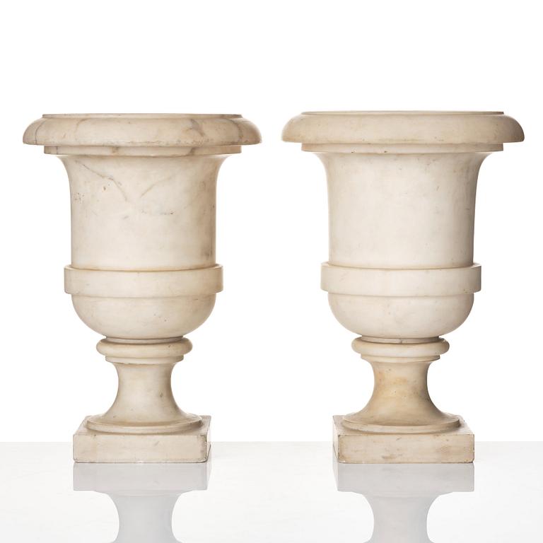 A pair of white marble urns, presumably Italy late 18th century.