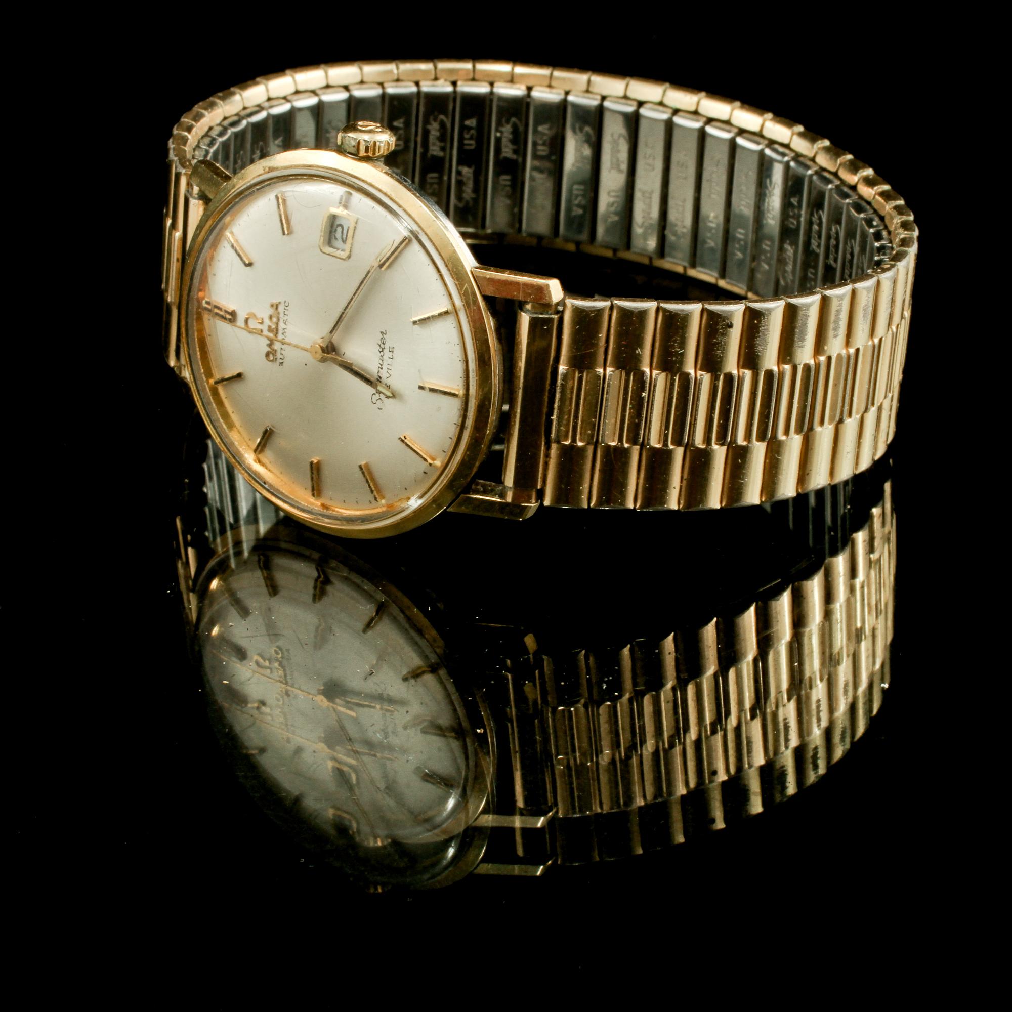 ARMBANDSUR, herr, guld och stål, "De Ville", Omega. 1960-tal.