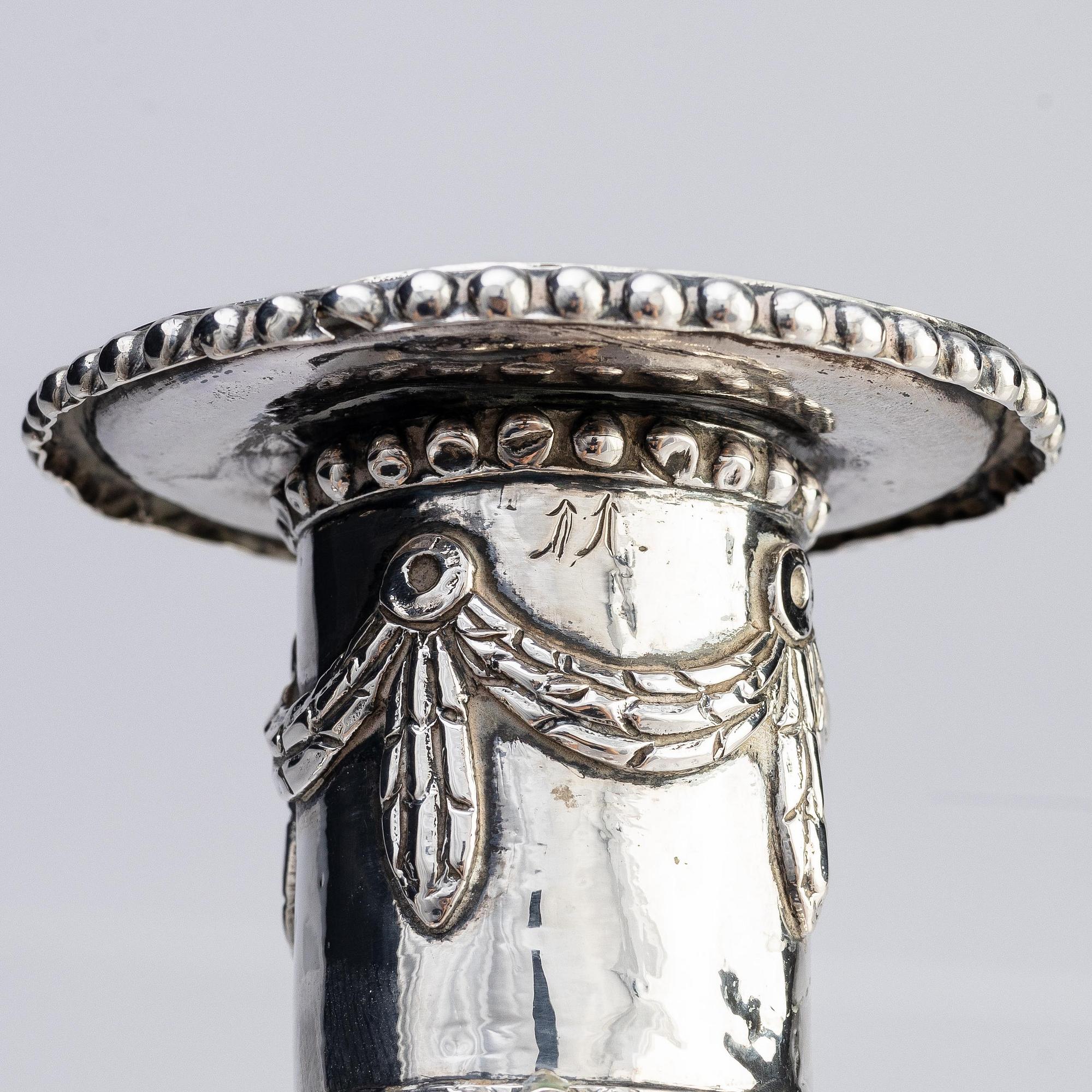 A pair of Swedish 18th century silver candlesticks, marks of Fredric Meyer, Karlshamn 1787.