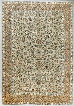 A Keshan rug, 393 x 270 cm.